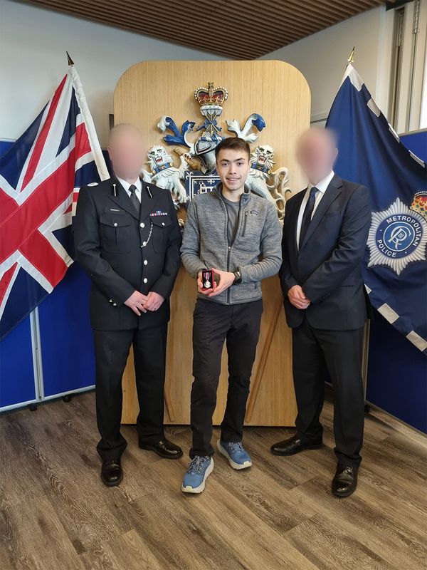 Ben receiving a medal